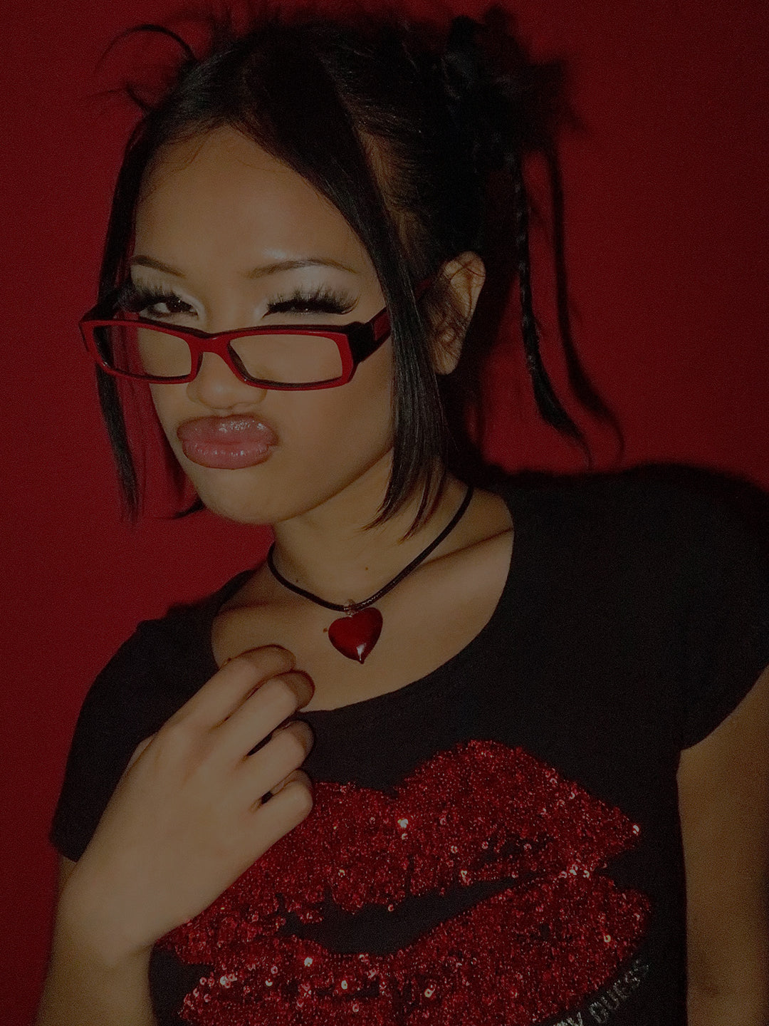 Woman wearing clear bayonetta glasses from  the Clear Bayonetta-Style Eyewear collection by Giant Vintage