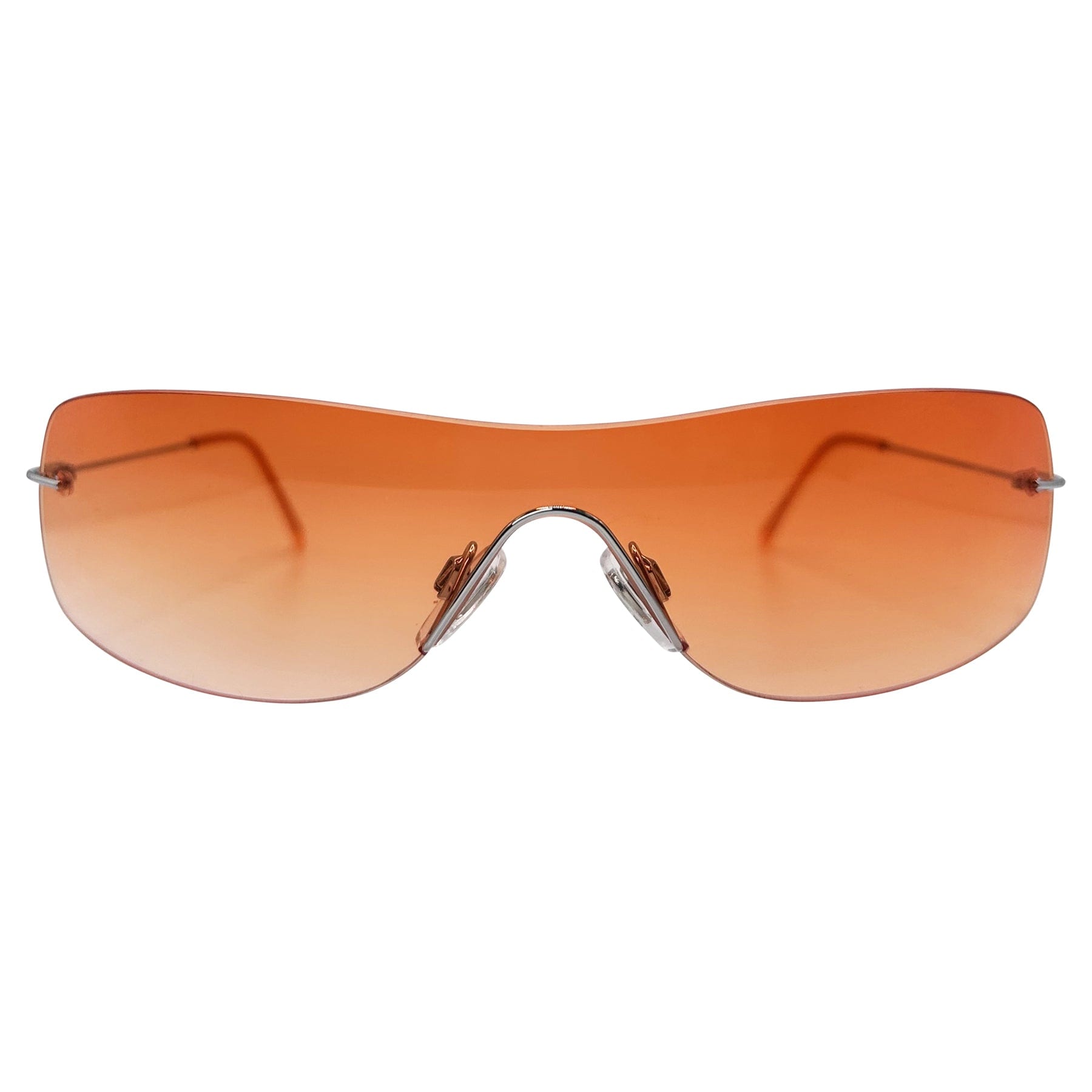 unique sunglasses with a vibrant orange gradient lens and y2k rimless shield style