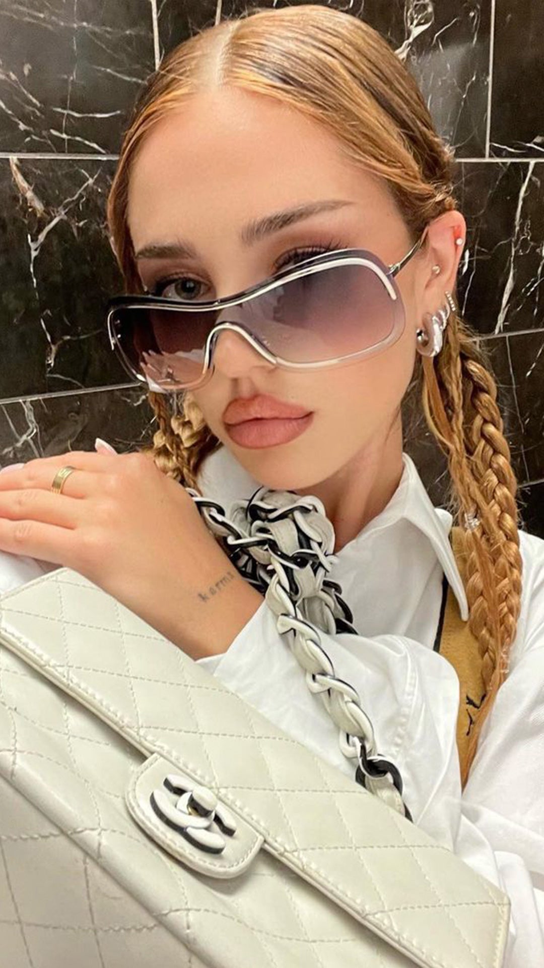 Influencer Delilah Belle Hamlin wearing  REDS Smoke Retro Sunglasses  by Giant Vintage