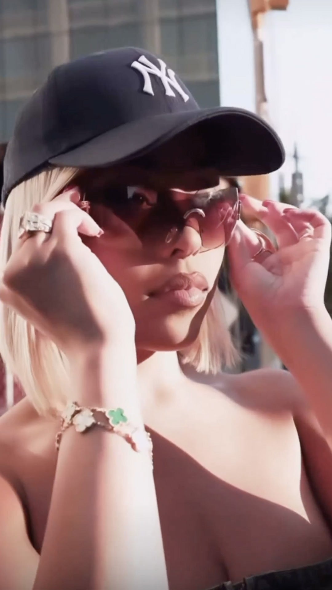 Influencer Jordyn Woods wearing Helium y2k  sunnies by Giant Vintage