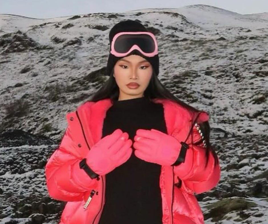 Woman in the snow wearing pink Giant Vintage Ski Goggles called SNOWCAP